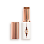 UNREAL SKIN SHEER GLOW TINT HYDRATING FOUNDATION STICK 14 DEEP